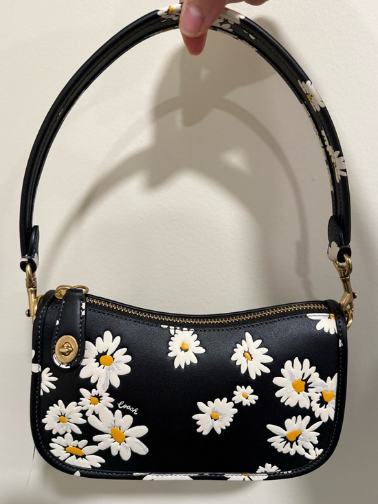 Coach Handbags - Coach Swinger Bag 20
With Floral Print